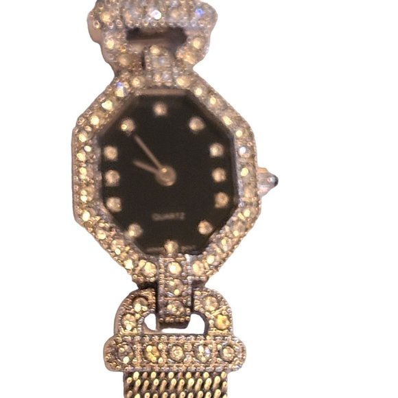 AVON Jewelry - Avon ELIZABETH TAYLOR SILVER TONE LADIES WATCH MIDNIGHT ROMANCE